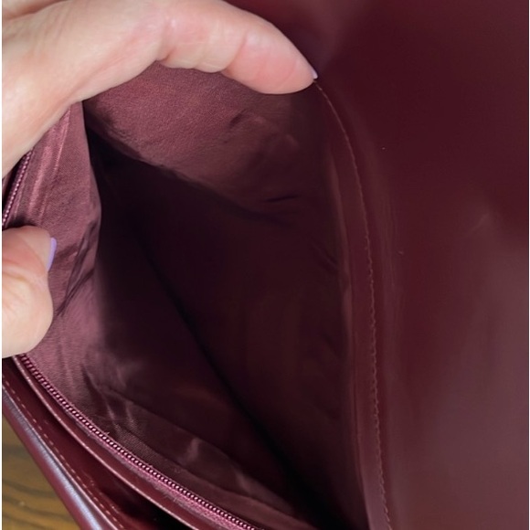 Cartier large leather envelope wristlet/clutch in excellent used conditions